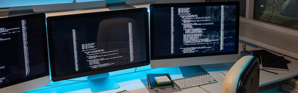 Part of large openspace office of programming company