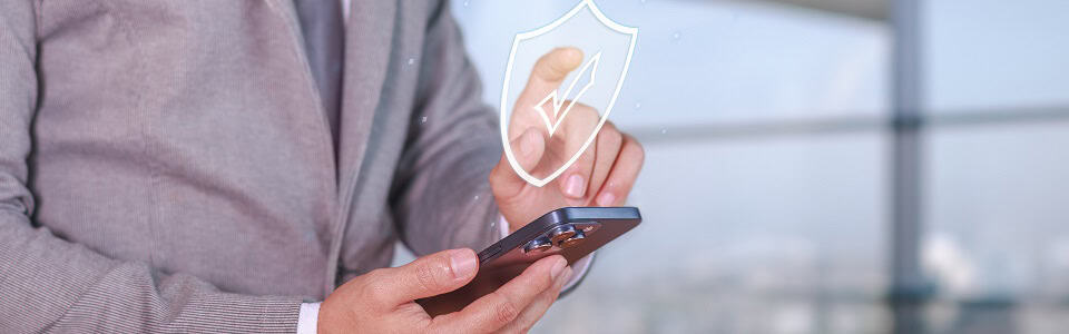 Cybersecurity and privacy protection for smartphone users. Businessman using cybersecurity technology to surf the Internet.