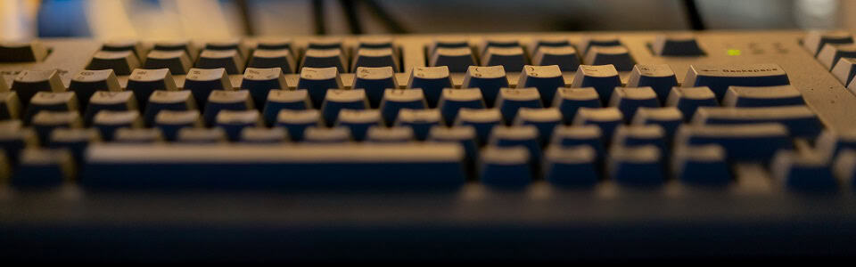 close-up keyboard in software system data center vulnerable cyber security server room technology digital world metaverse