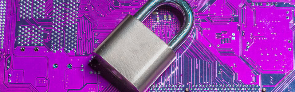 padlock on a computer circuit board