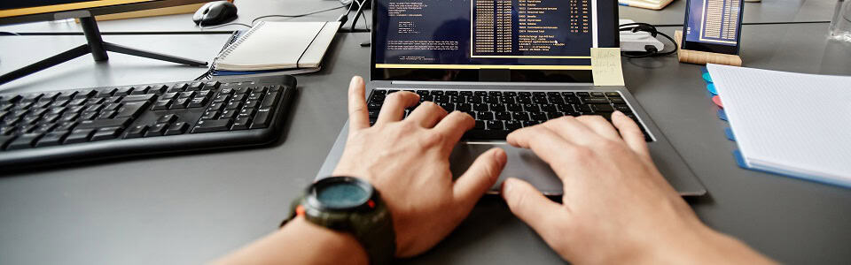 Programmer Writing Code POV