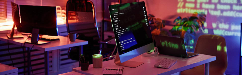 Abandoned openspace office with computer monitors on desks